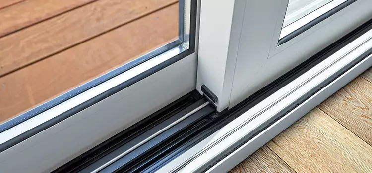 Why Your Sliding Door Keeps Getting Stuck in Irondequoit, NY?